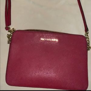 Cranberry colored over the shoulder purse